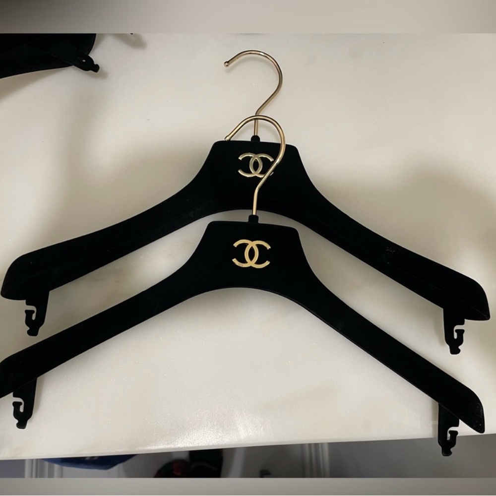 CHANEL Black Hangers with Gold Accents